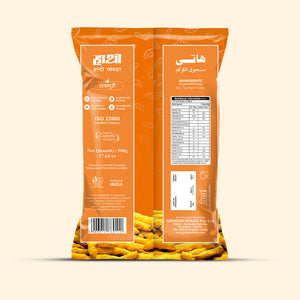 Back label of Hathi Rajapuri Turmeric Powder 500g orange pack showing dry turmeric ingredients, nutrition facts, ISO 22000 certification and Gandhi Spices Pvt Ltd Rajkot manufacturing details