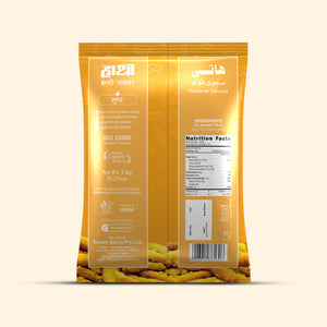 Back label of Hathi Super Turmeric Powder 1kg golden yellow pack showing dry turmeric ingredients, nutrition facts, ISO 22000 certification and Gandhi Spices Pvt Ltd Rajkot manufacturing details